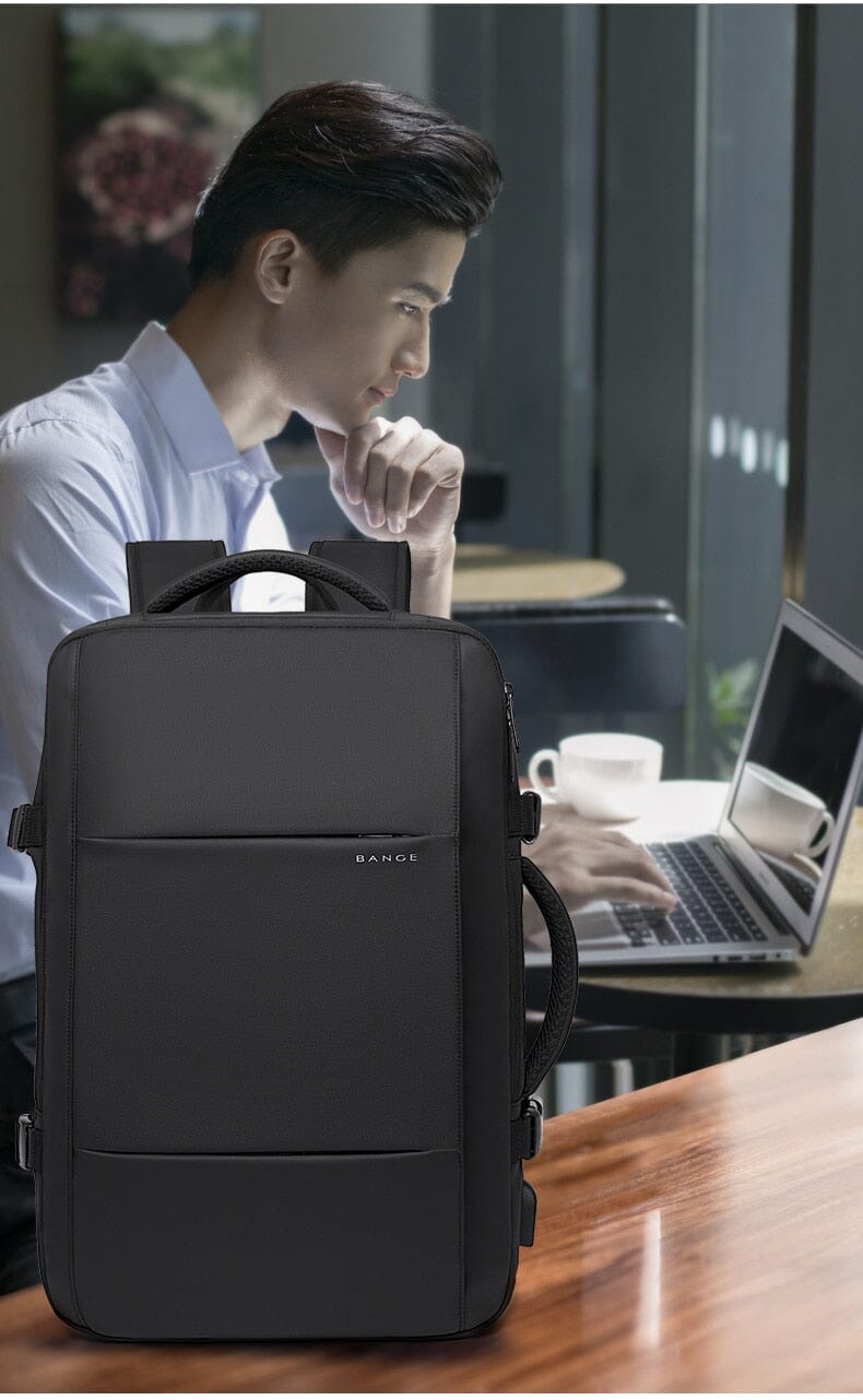 Deluxe Expandable Travel Backpack - Accommodates 17" Laptops, Waterproof Design, USB Charging Port Included