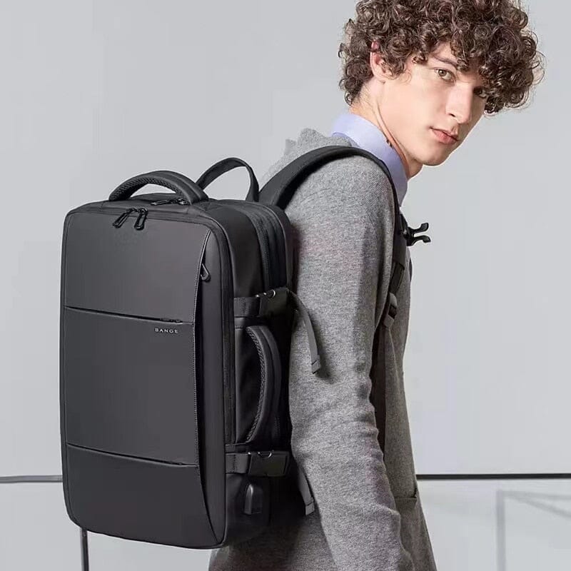 Deluxe Expandable Travel Backpack - Accommodates 17" Laptops, Waterproof Design, USB Charging Port Included