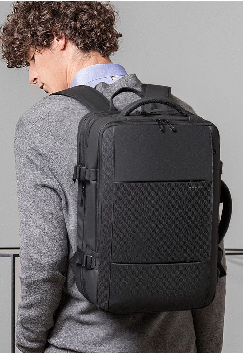 Deluxe Expandable Travel Backpack - Accommodates 17" Laptops, Waterproof Design, USB Charging Port Included